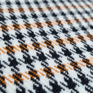 Bezugsstoff Autostoff Pepita schwarz / weiss / orange